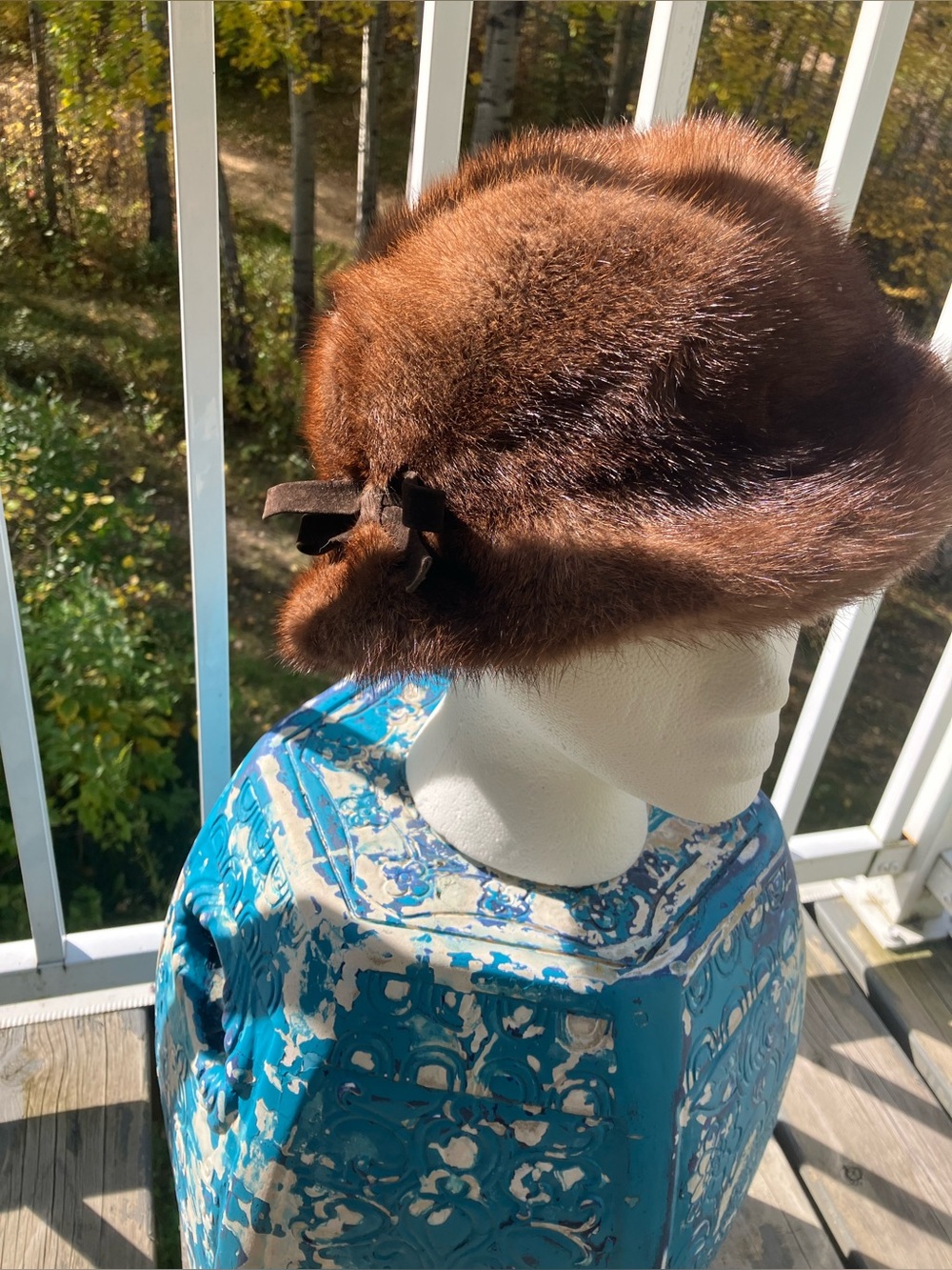 Vintage sophisticated mink hat with a broom